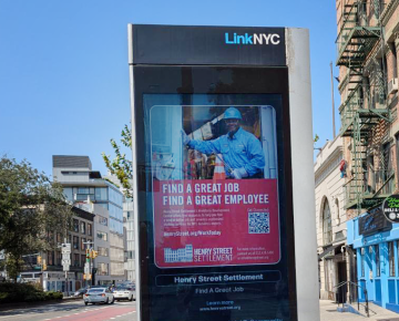 LinkNYC kiosk monitor displays Henry Street PSA.