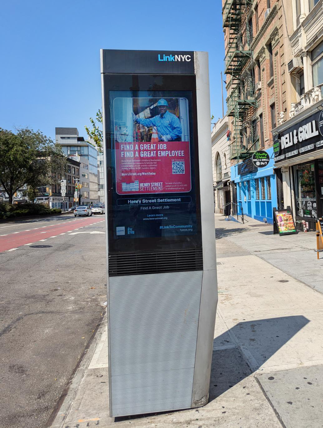 LinkNYC kiosk monitor displays Henry Street PSA.